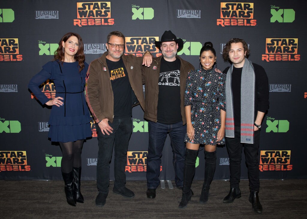 Executive producer Dave Filoni and several cast members of Star Wars Rebels pose for a photo at the series' finale celebration.