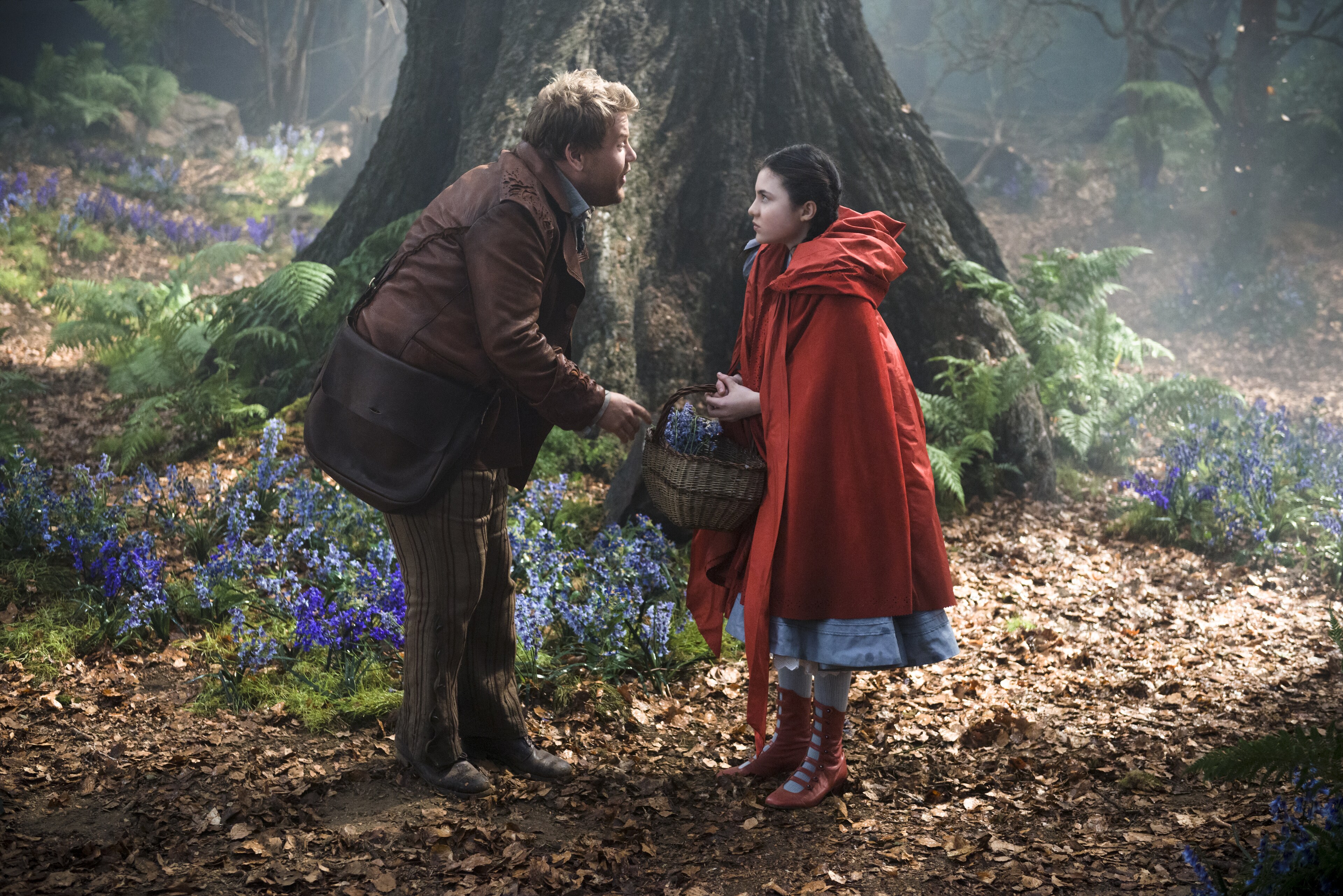 James Corden as the baker and Lilla Crawford as Little Red Riding Hood in "Into the Woods"