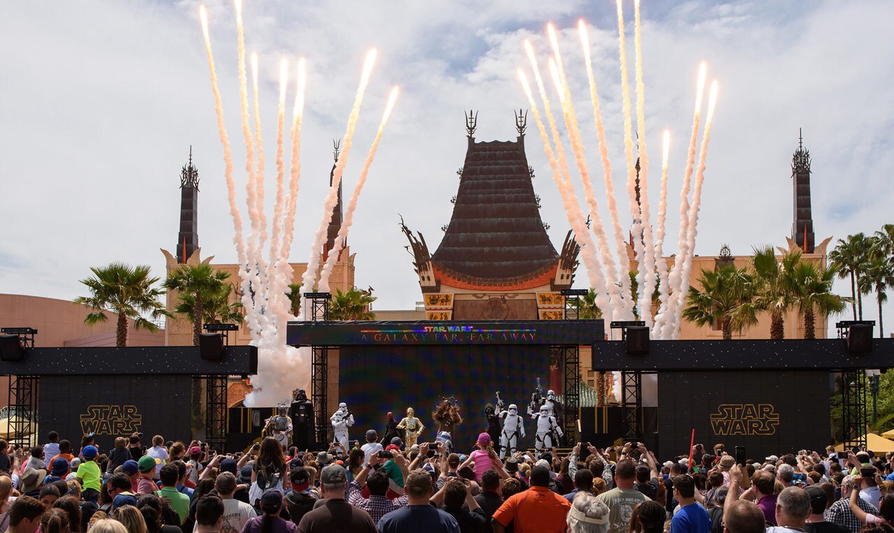 A large crowd watches a Star Wars stage show in front of the Chinese Theater at Disney's Hollywood Studios.
