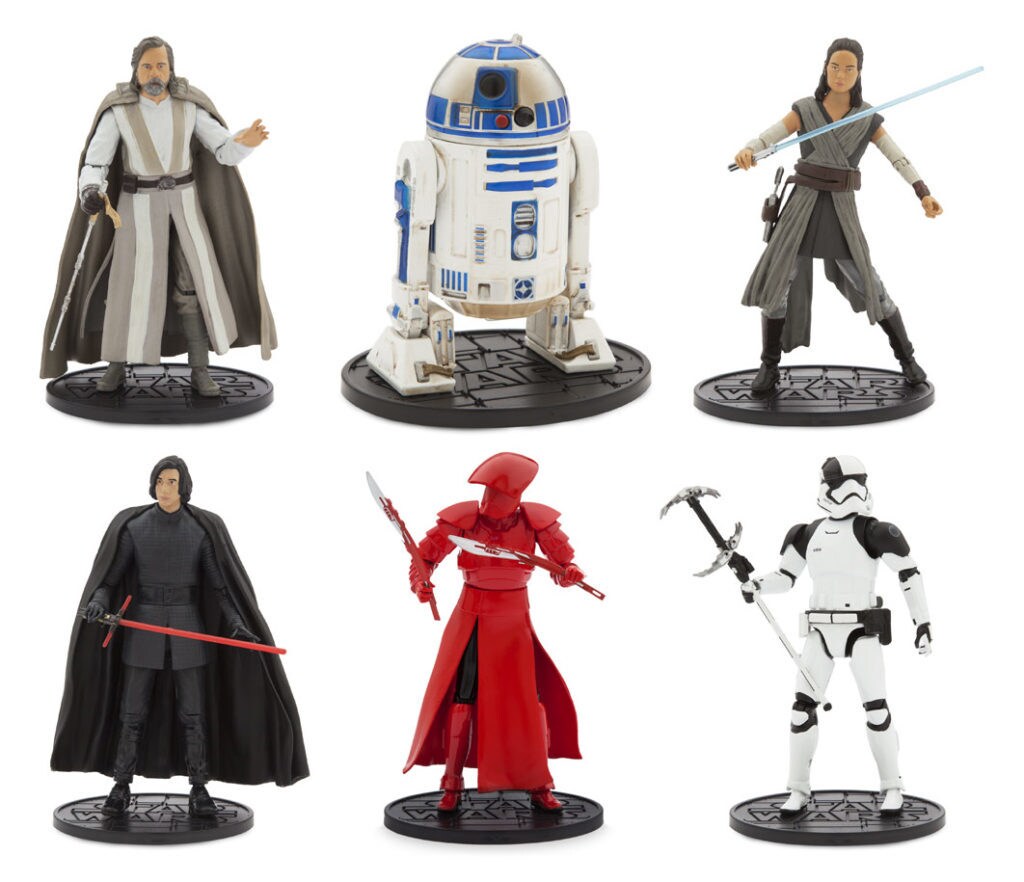 Action figures inspired by Star Wars: The Last Jedi, including Luke Skywalker, R2-D2, Rey, Kylo Ren, a Praetorian Guard, and a stormtrooper.