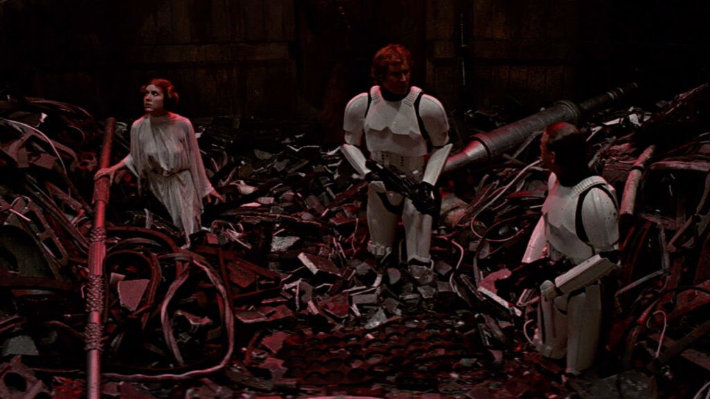 Leia, Han, and Luke inside the Death Star garbage compactor in Star Wars: A New Hope.