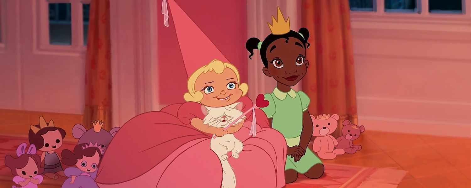 Young Tiana and Charlotte La Bouff from The Princess and the Frog sit with dolls and a cat.