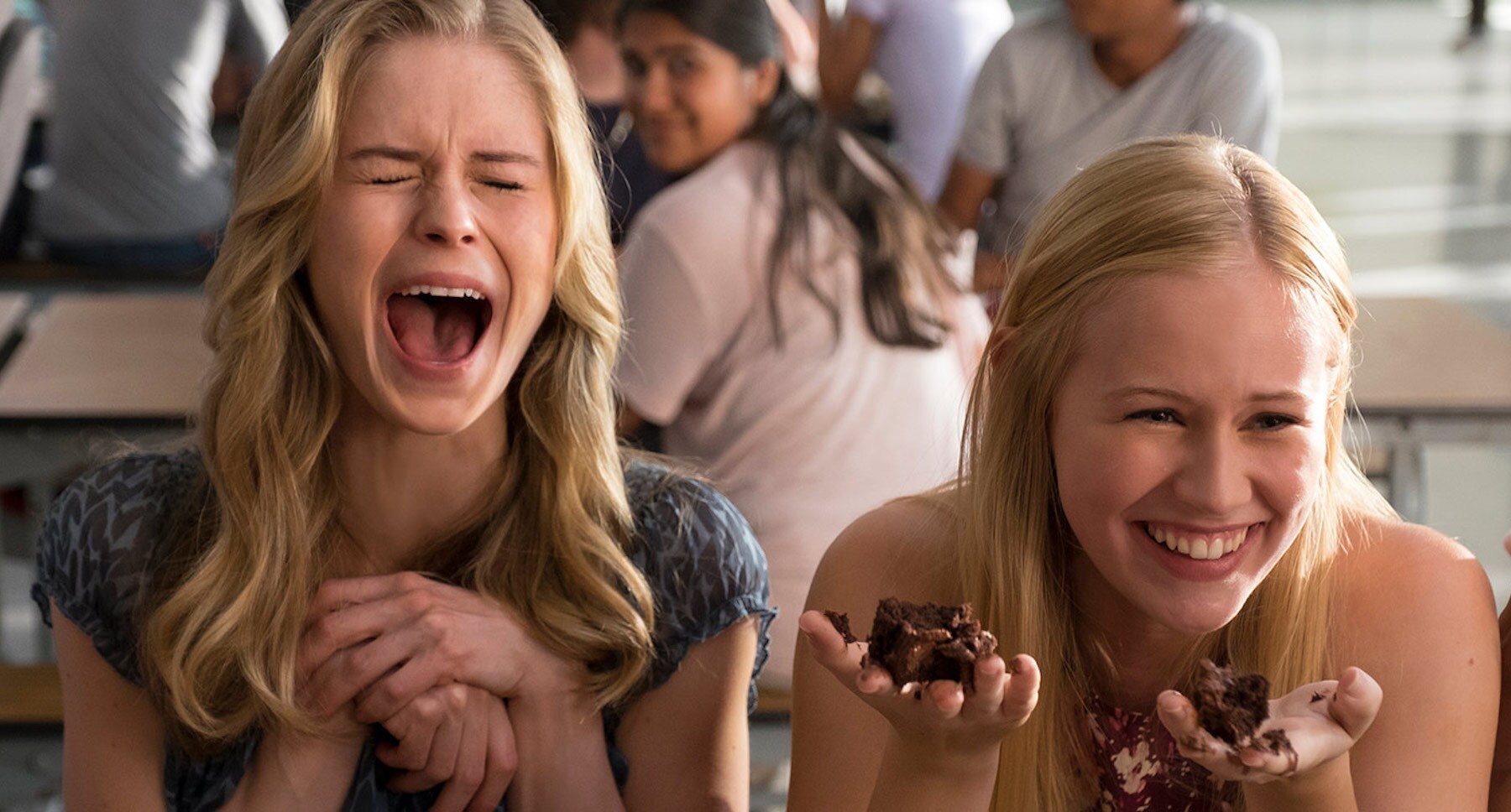 Two girls laughing in the movie "The Miracle Season"