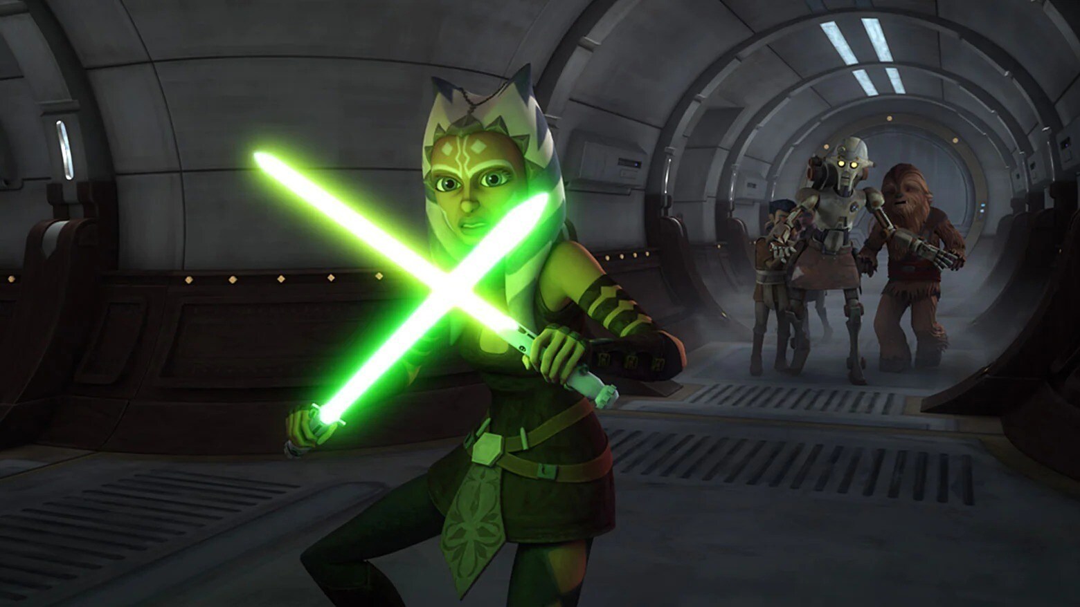 Ahsoka wielding two green lightsabers to protect younglings in The Clone Wars