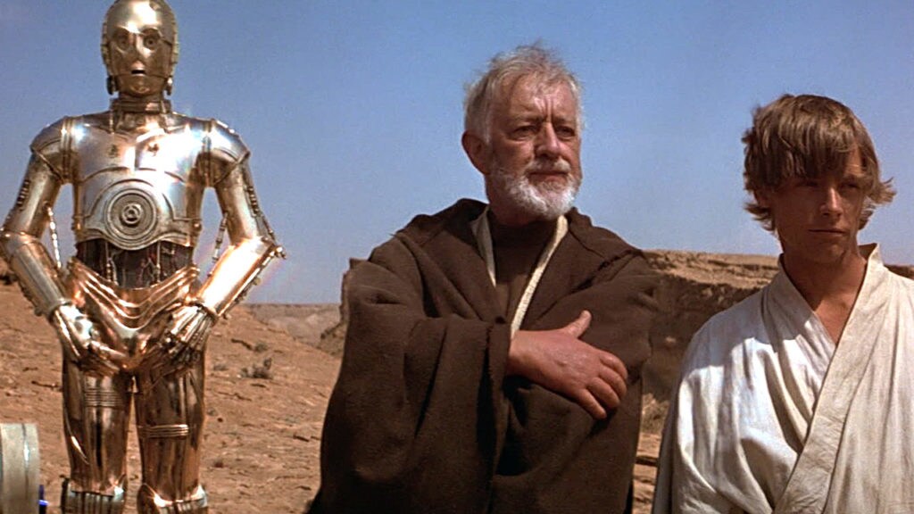 C-3PO, Obi-Wan, and Luke on Tatooine in A New Hope.