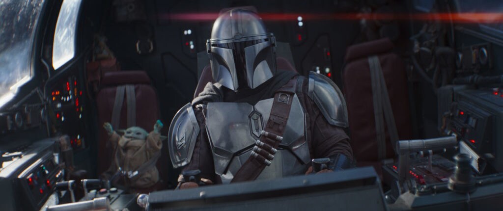 The Mandalorian piloting the Razor Crest