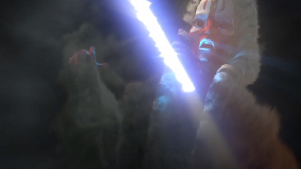 Shaak Ti is impaled by a lightsaber.