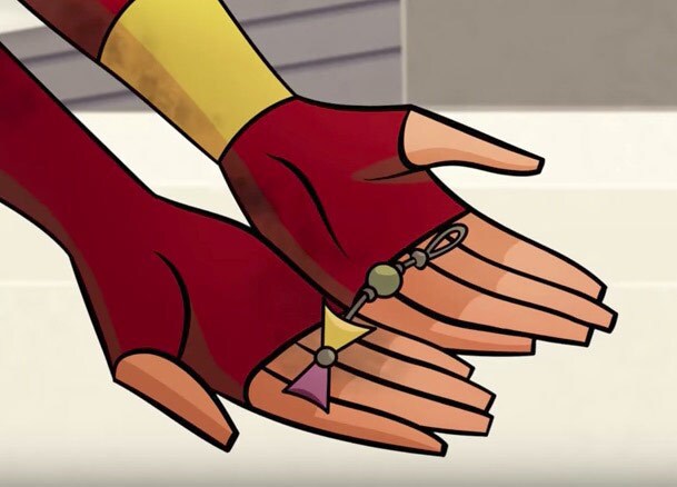 Ahsoka Tano holds beads given to her by Yoda in Star Wars Forces of Destiny.
