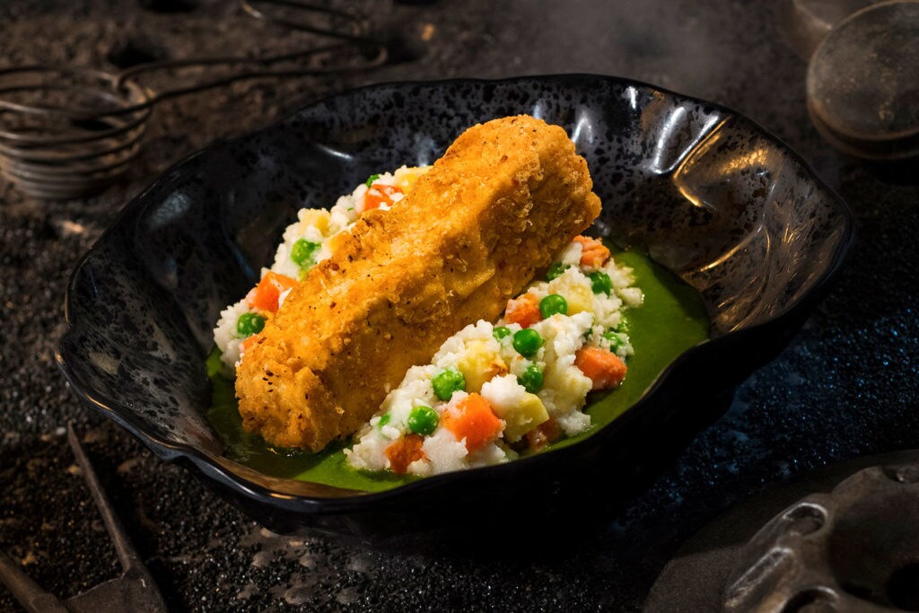 The Fried Endorian Tip-Yip, found at Docking Bay 7 Food and Cargo inside Star Wars: Galaxy’s Edge, is a decadent chicken dish with roasted vegetable mash and herb gravy. (David Roark/Disney Parks)
