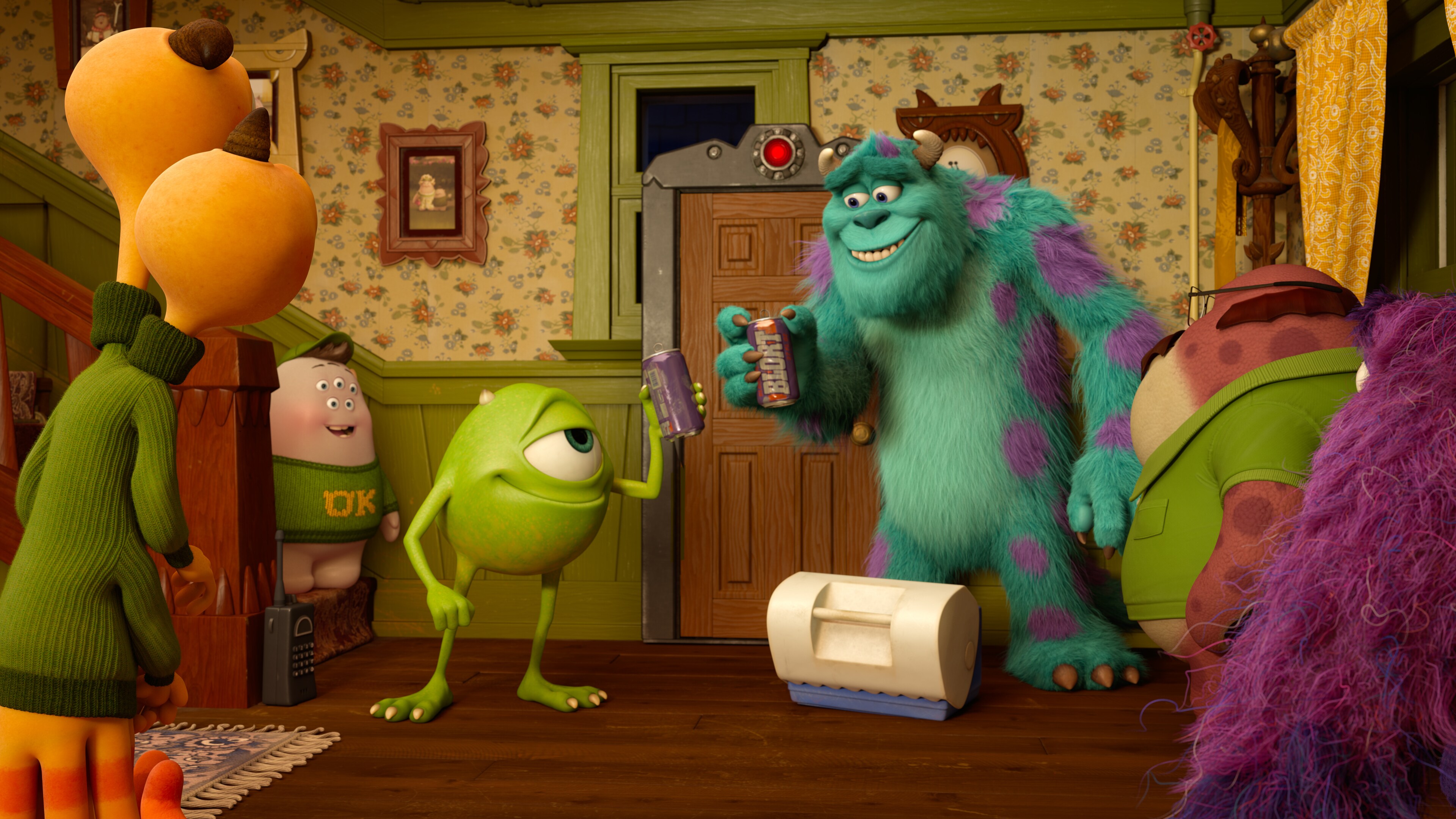 Mike (voiced by Billy Crystal) and Sully (voiced by John Goodman) in the Disney•Pixar movie Party Central.