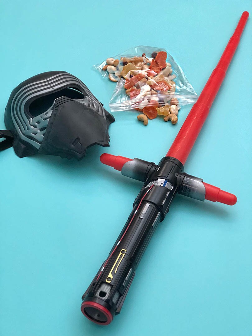 A snack bag and supplies to make a Star Wars Celebration cosplay.
