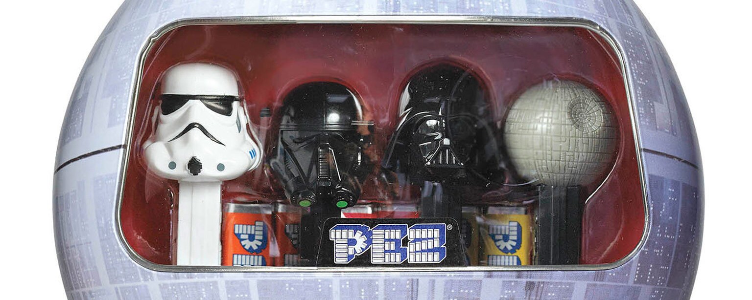Stormtrooper, death trooper, Darth Vader, and Death Star Pez dispensers.