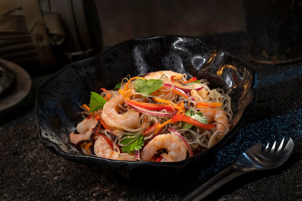 The Yobshrimp Noodle Salad, found at Docking Bay 7 Food and Cargo inside Star Wars: Galaxy’s Edge, is a marinated noodle salad with chilled shrimp. (David Roark/Disney Parks)