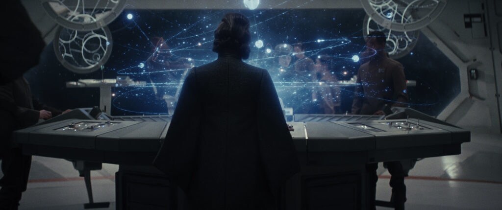 General Leia Organa looks at a star map in The Last Jedi.