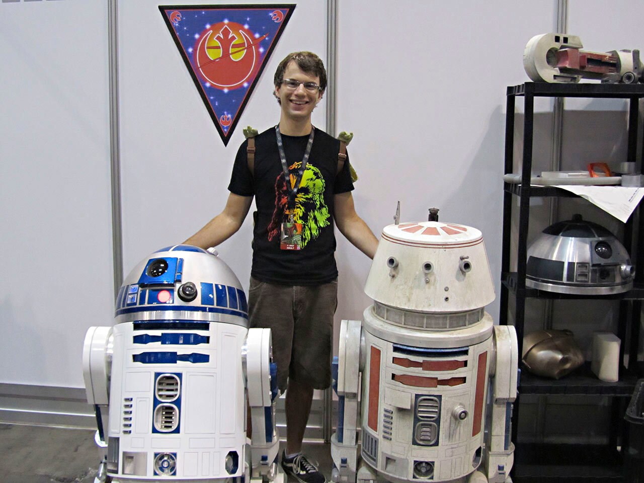 Dustin posing with a couple of droids