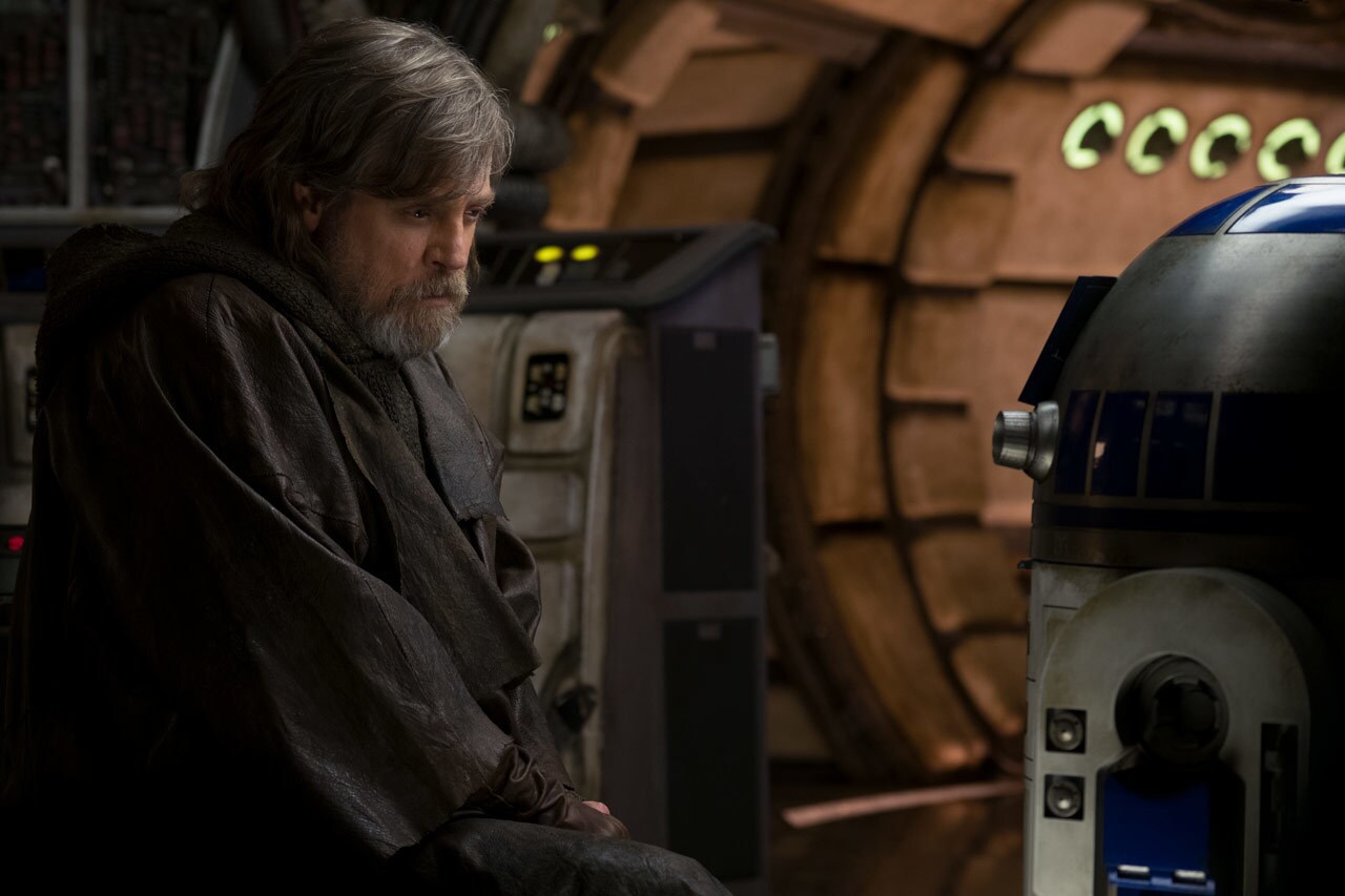 Luke looks at R2-D2 in The Last Jedi.