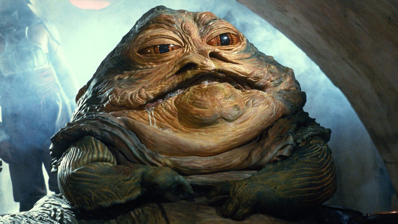 Jabba sits on his throne in Return of the Jedi.
