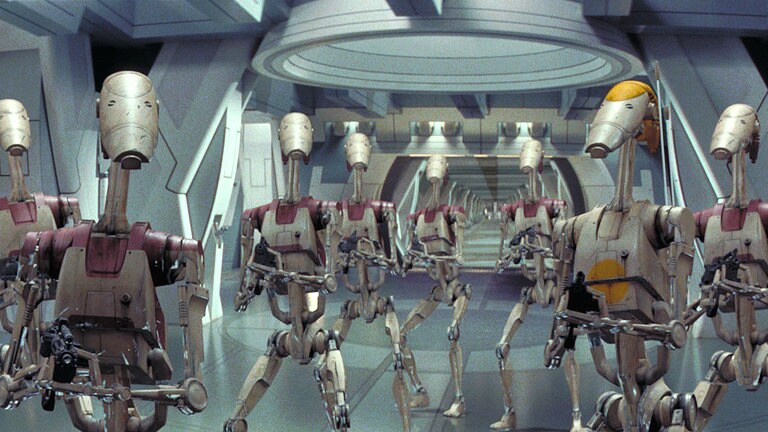 Battle droids aim their rifles in The Phantom Menace.