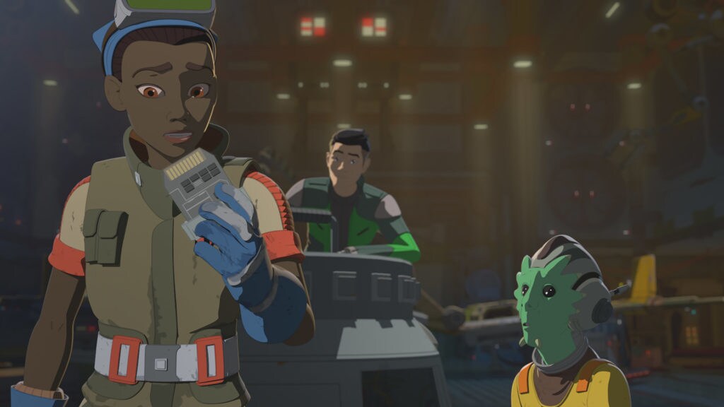 Tam holds a CoMar tri-tracker trip in Star Wars Resistance.