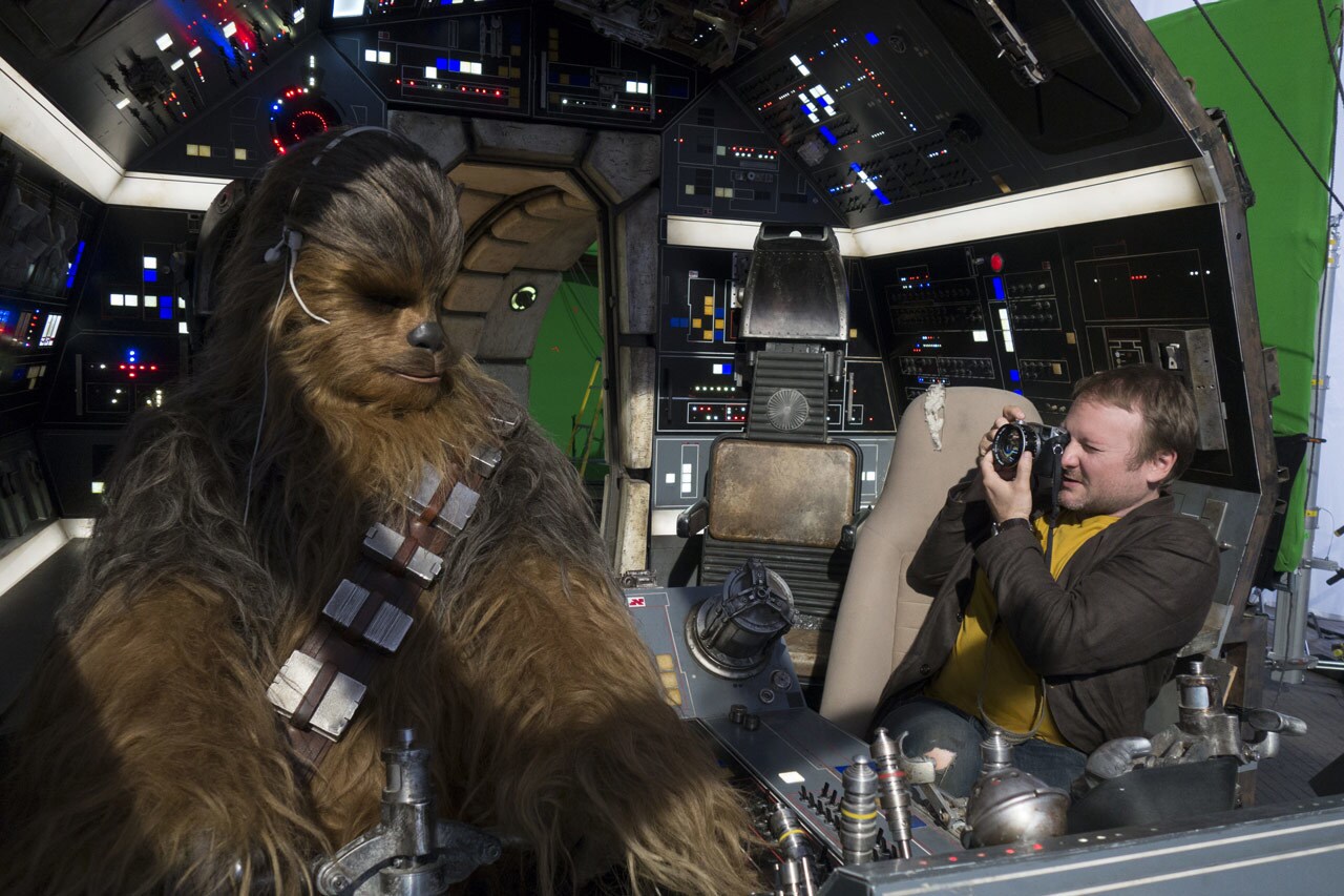 Chewbacca photographed in the pilot seat of the Millennium Falcon.