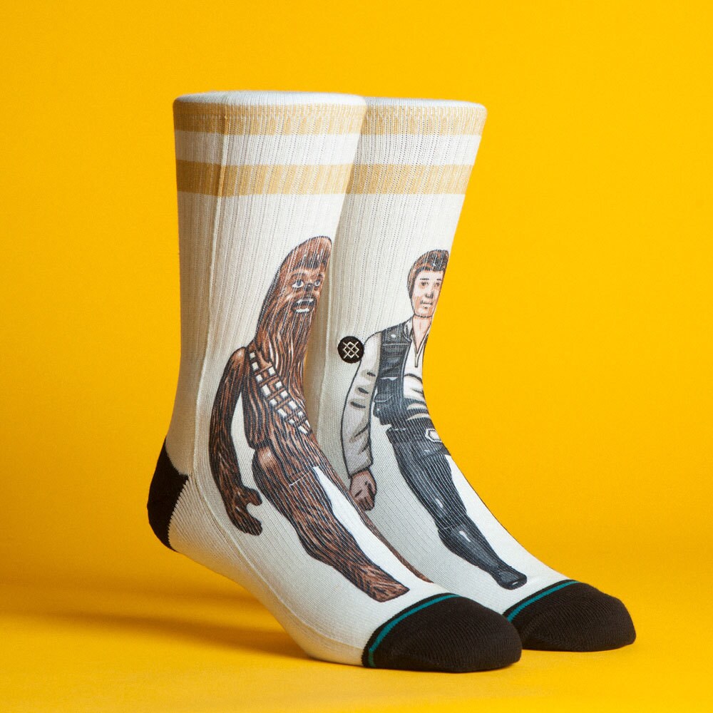 A pair of Star Wars-themed socks by California-based clothing brand Stance. One sock features Chewbacca while the other features Han Solo.