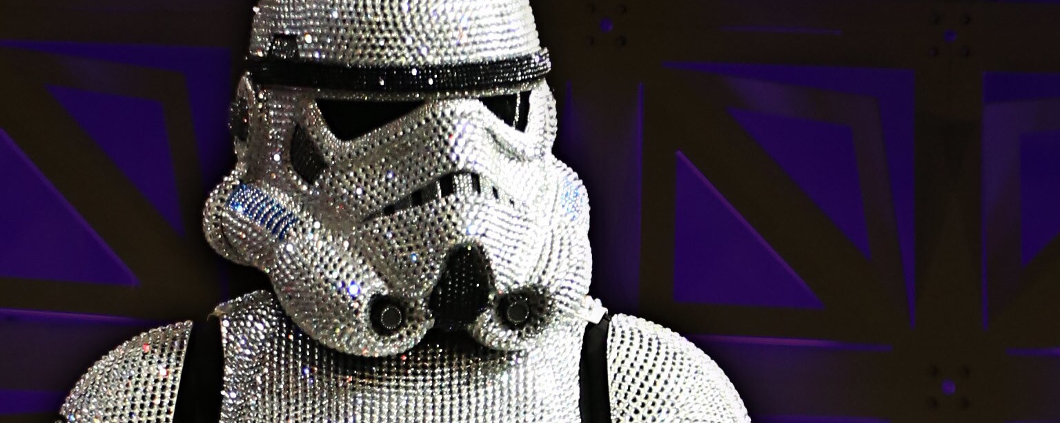 A cosplayer dressed in a crystal encrusted stormtrooper costume at Star Wars Celebration Championships of Cosplay.