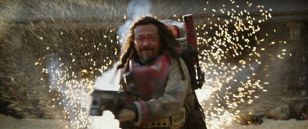 Baze Malbus fires his repeating cannon while under attack in Rogue One.