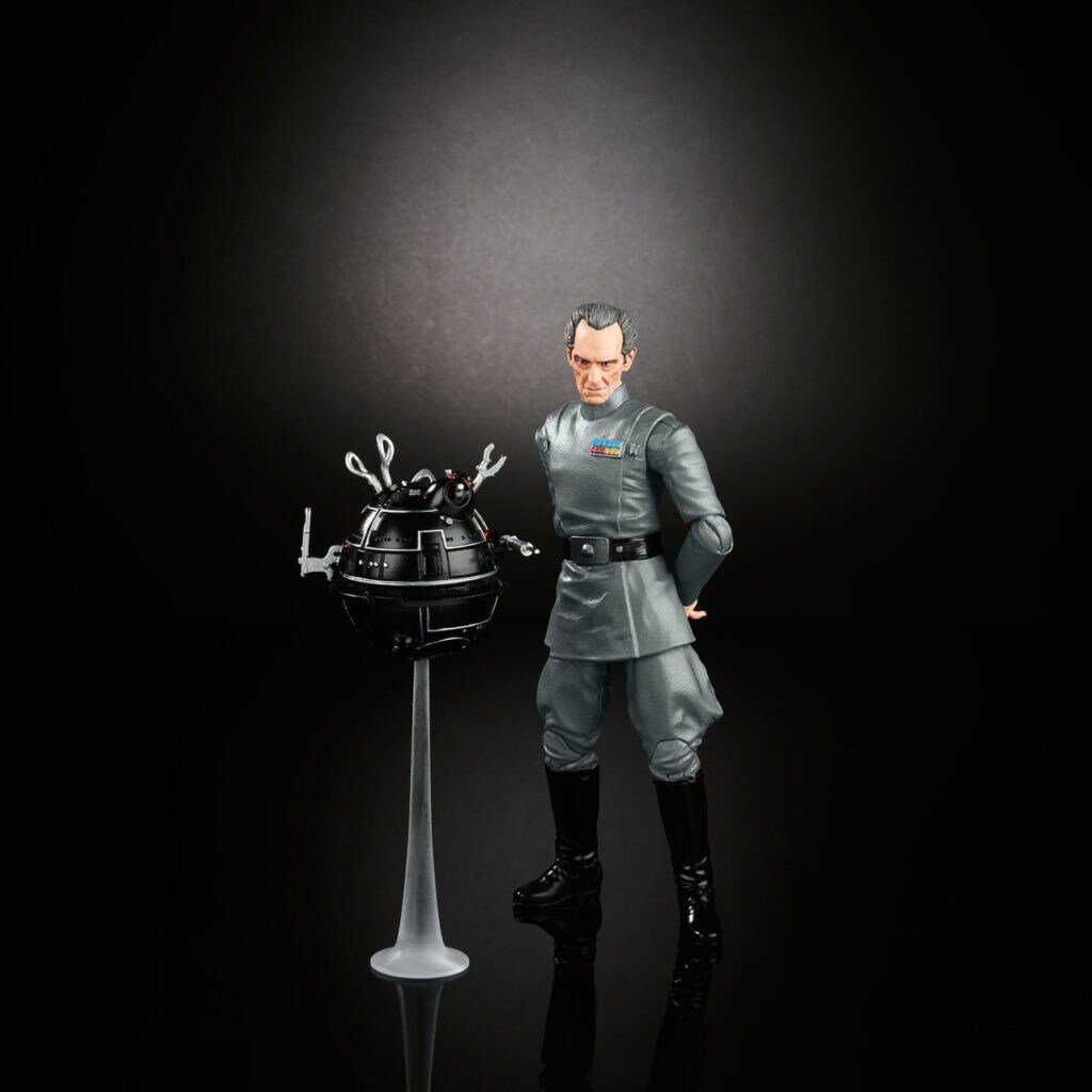 A Grand Moff Tarkin action figure with an IT-O droid by Hasbro.