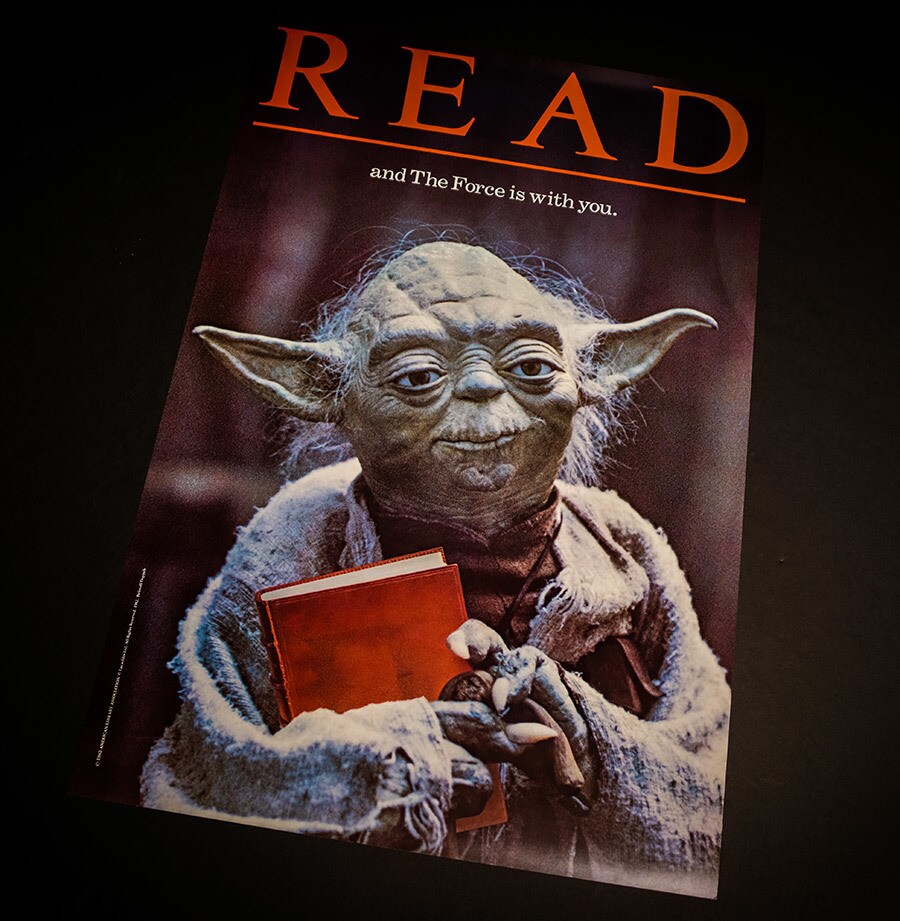 A vintage Read poster featuring Yoda.