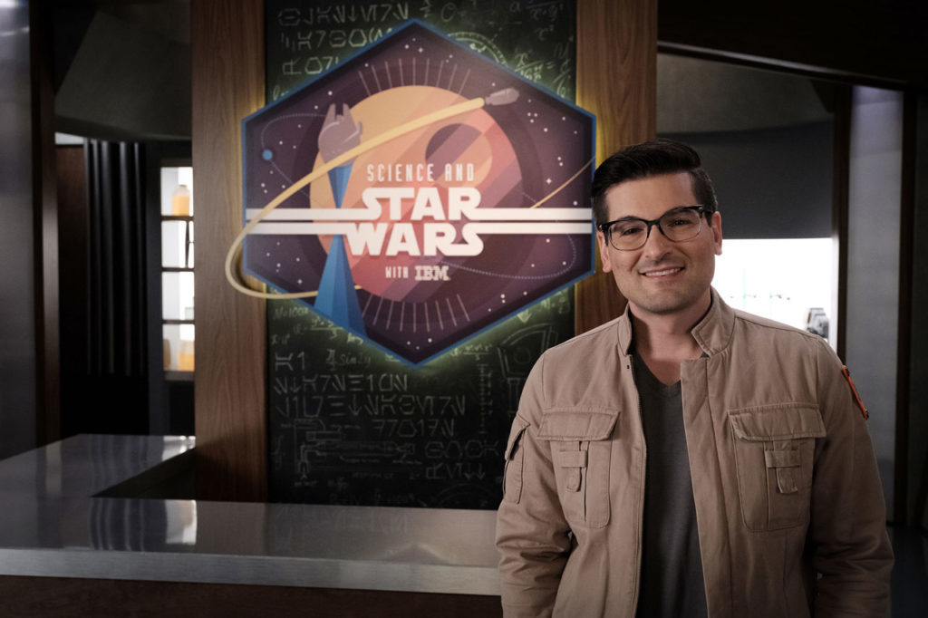 Host Anthony Carboni smiles on the set of Science and Star Wars with IBM.