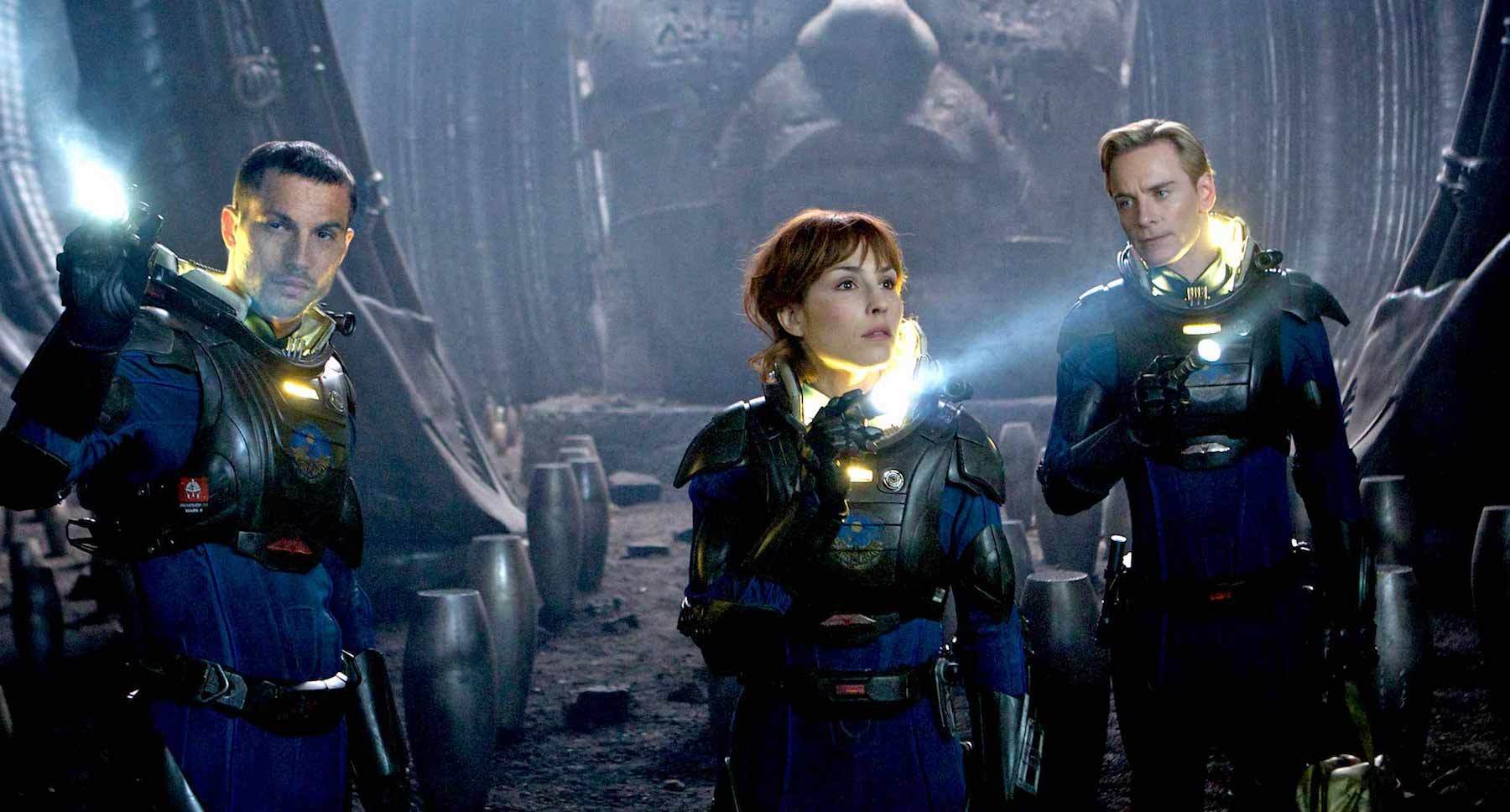 Noomi Rapace (as Elizabeth Shaw), Michael Fassbender (as David) and Logan Marshall-Green (as Charlie Holloway) in "Prometheus"