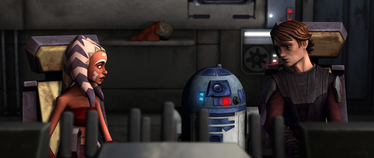 Anakin and Ahsoka Tano sit and talk while R2-D2 stands between them in The Clone Wars.