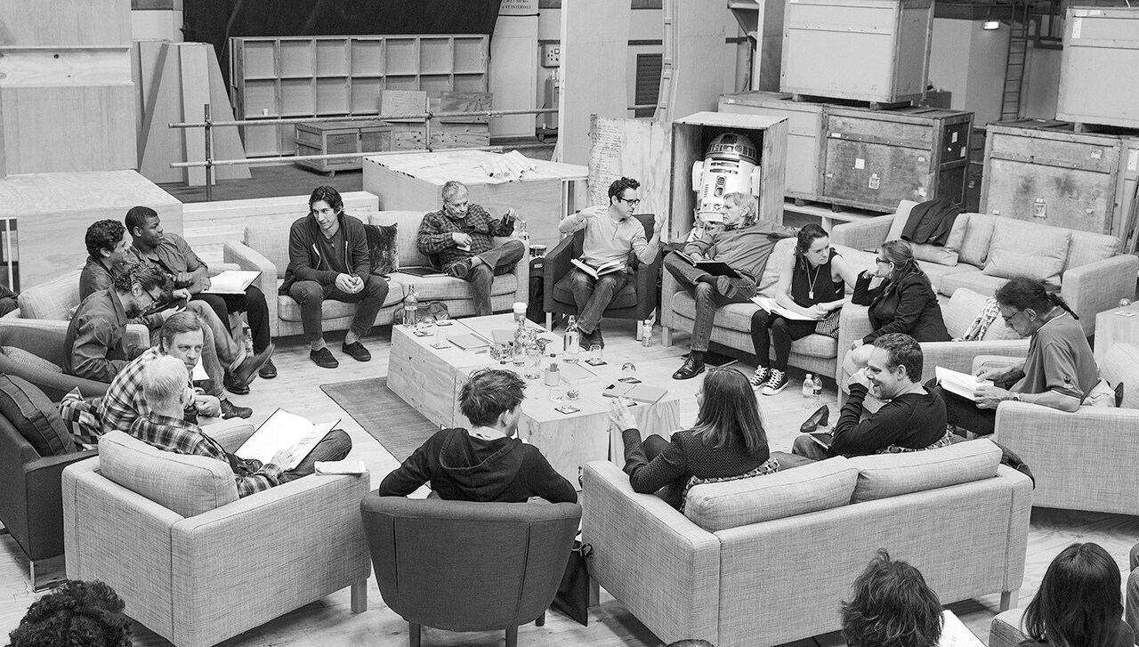 April 29, Pinewood Studios, UK – Writer/Director/Producer J.J Abrams (top center right) at the cast read-through of Star Wars: Episode VII at Pinewood Studios with (clockwise from right) Harrison Ford, Daisy Ridley, Carrie Fisher, Peter Mayhew, Producer Bryan Burk, Lucasfilm President and Producer Kathleen Kennedy, Domhnall Gleeson, Anthony Daniels, Mark Hamill, Andy Serkis, Oscar Isaac, John Boyega, Adam Driver and Writer Lawrence Kasdan. Copyright and Photo Credit: David James.