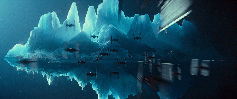 Squadrons of TIE fighters fly toward ice mountains.