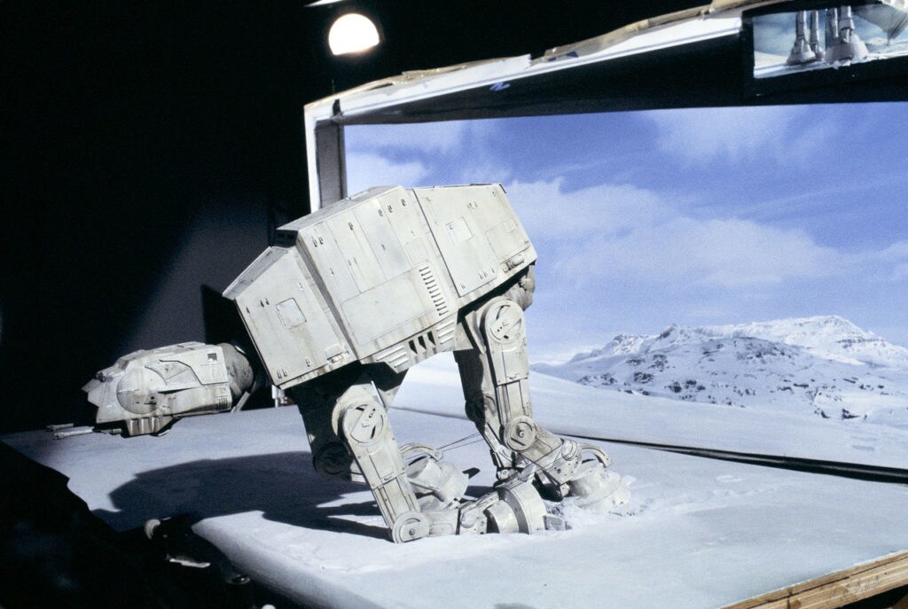 A behind the scenes look at an AT-AT on the model set of the snowy planet Hoth.