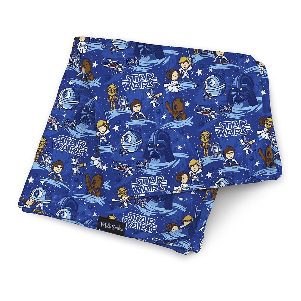 D23 Expo 2022 exclusive Milk Snob Star Wars blanket featuring cartoonish versions of Darth Vader, Luke Skywalker, and more, on a blue starry background.