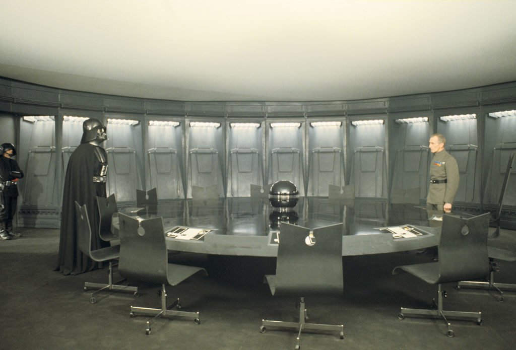 Darth Vader and Grand Moff Tarkin in the Death Star conference room.