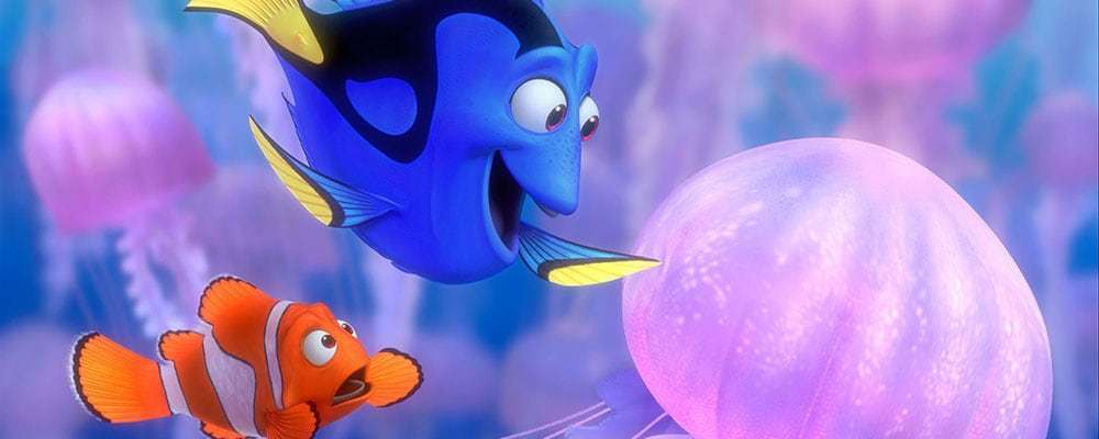 Dory touches a jellyfish while Marlin looks worried.