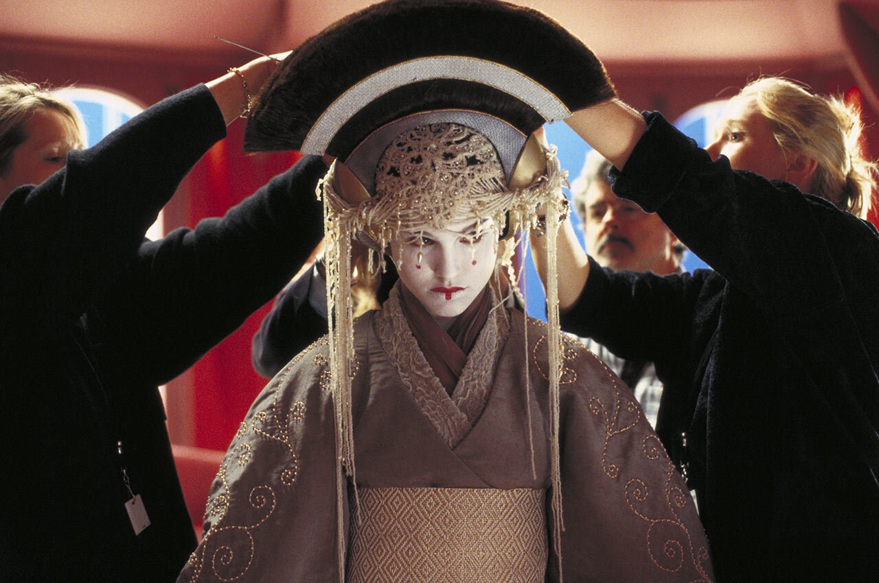 Padmé’s headpiece and outfit being set up by the costume team