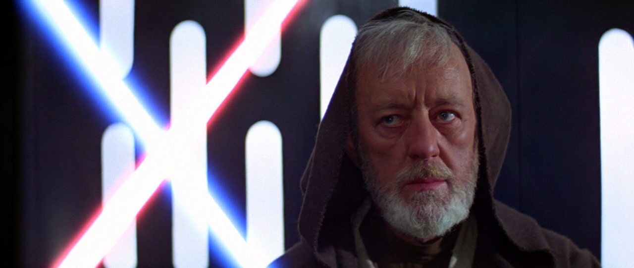 Obi-Wan crosses lightsabers with Darth Vader in A New Hope.
