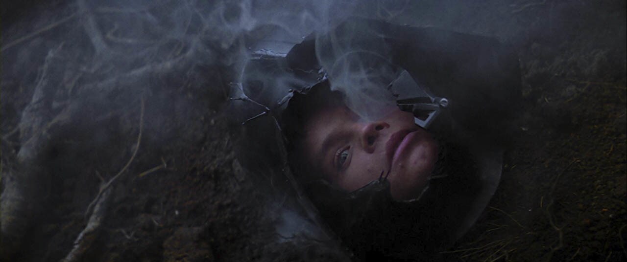 Luke faces Vader in the dark side cave on Dagobah