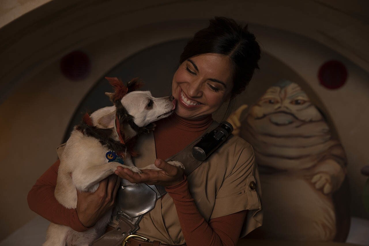 Jennifer Landa poses with her dog, Chuy, who is dressed as Salacious B. Crumb.