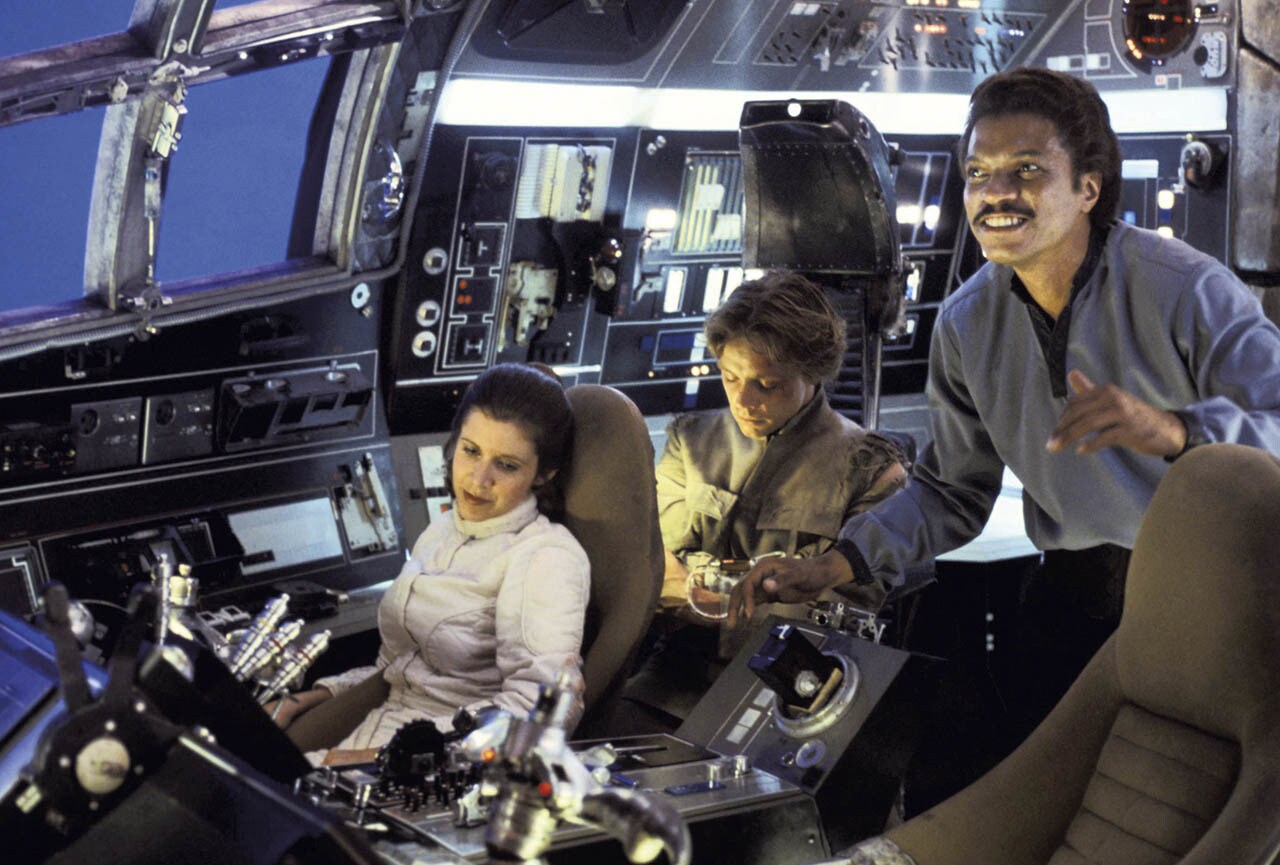 Lando Calrissian, Leia, and Luke in the Falcon behind the scenes in The Empire Strikes Back