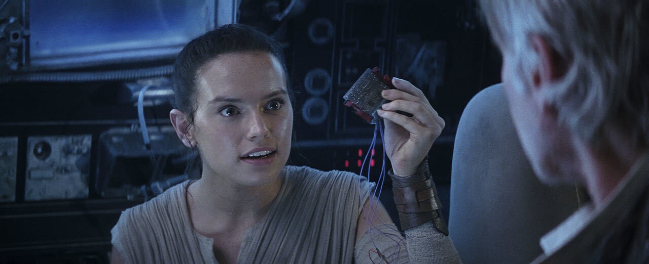 Rey talking to Han in Millennium Falcon