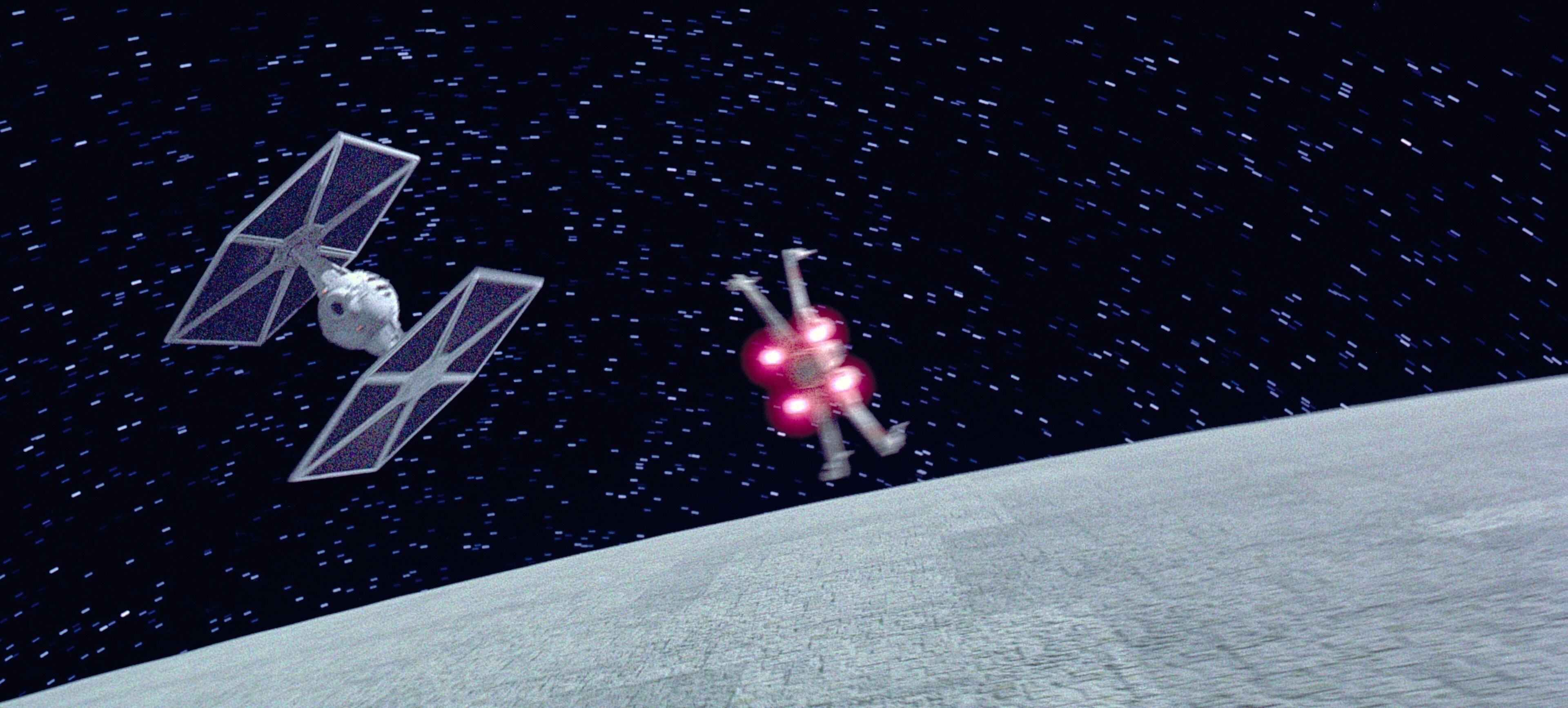 TIE fighters dueled the rebel X-wings and Y-wings above the Death Star’s surface, with Darth Vade...