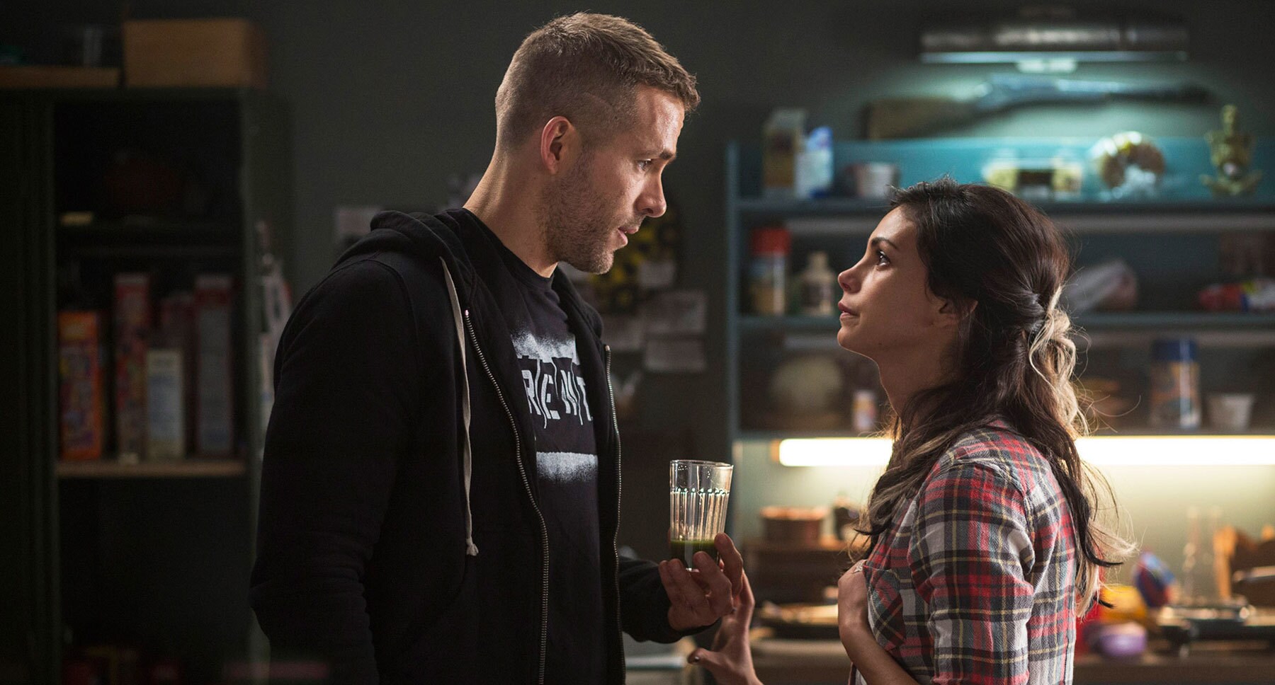 Ryan Reynolds (Deadpool) and Morena Baccarin (Vanessa) in their apartment in "Deadpool"