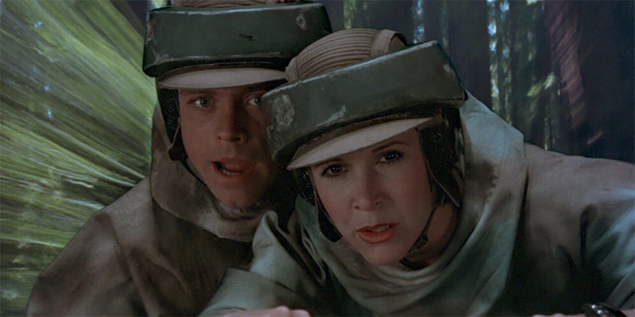 Leia and Luke being chased through Endor