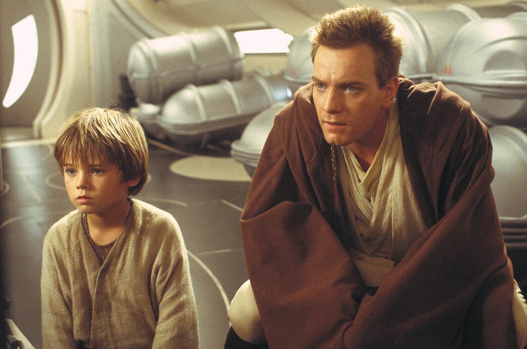 Anakin Skywalker (Jake Lloyd) and Obi-Wan Kenobi (Ewan McGregor).
