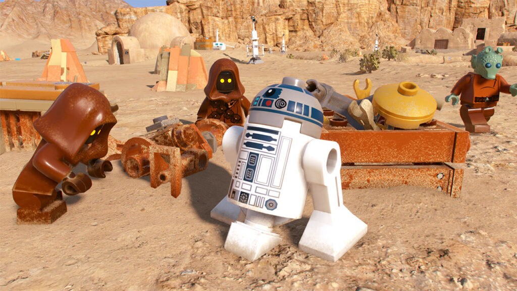 R2-D2 and two Jawas in the video game LEGO Star Wars: The Skywalker Saga.