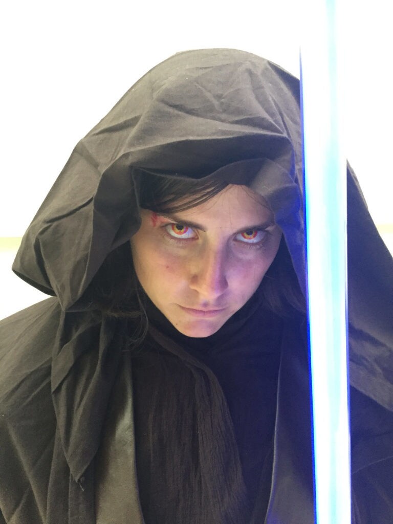 A cosplayer wears colored contacts to dress as Anakin Skywalker.